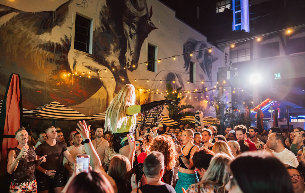drag queen brisbane, beer garden party filled with people at brisbane gay and queer bar